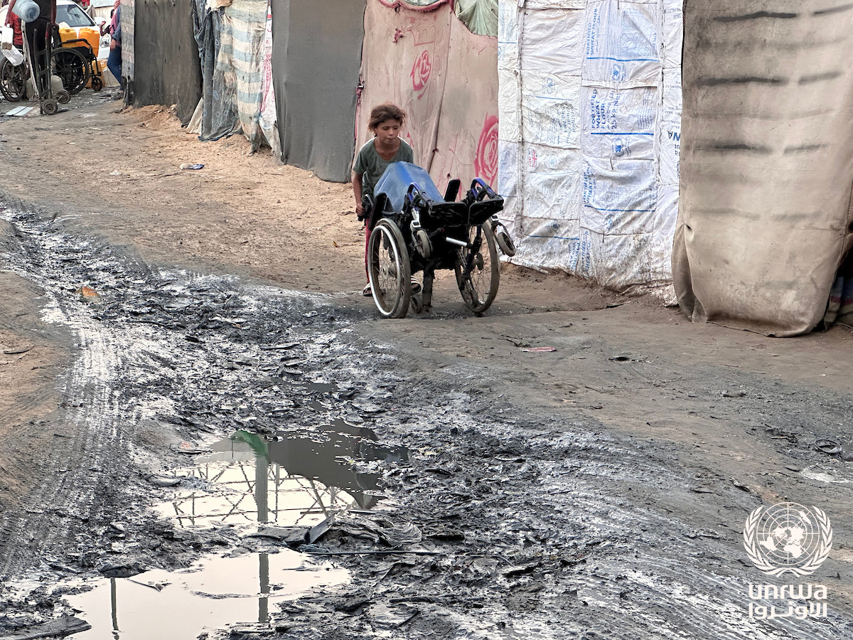 Sewage water near the tents of displaced people in Deir el-Balah, Gaza Strip